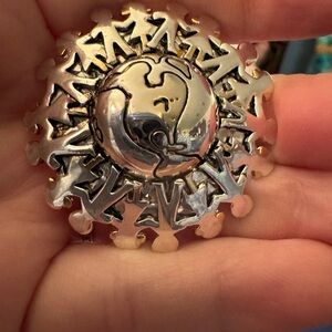 SIGNED MJ PIN OR PENDANT CHILDREN OF THE WORLD 3-d TWO-TONE brooch